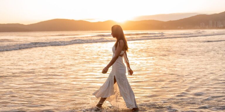 woman walking at beach