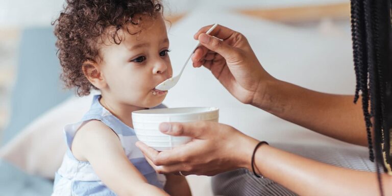 1739566134 mom feeding baby